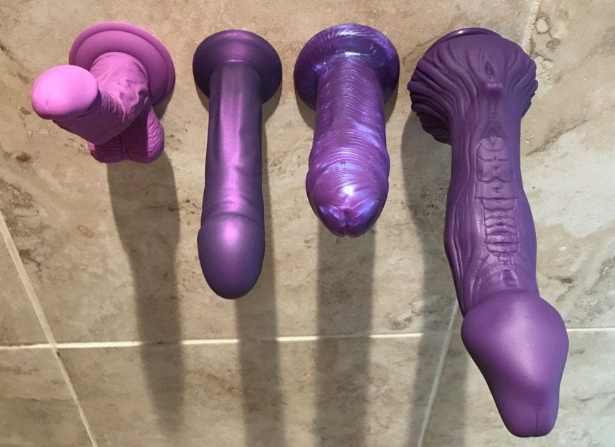 Four purple dildos on my shower wall: smallest to largest! Zuklat is huge.