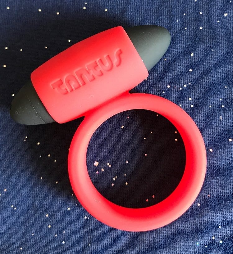 Tantus Vibrating Super Soft C-Ring red sparkly background