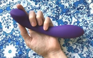 Lovehoney Desire Luxury Weighted Curved Dildo in hand