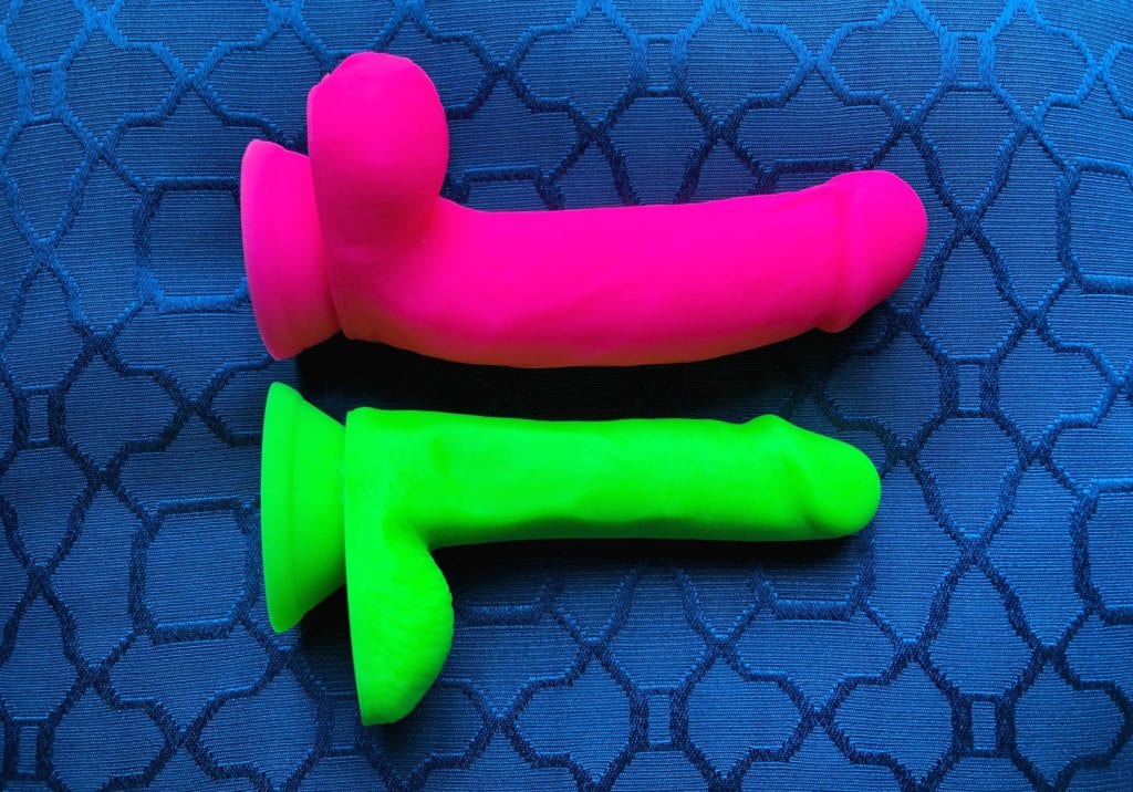 Neo Elite dildos - 7 inch and 6 inch on pillow