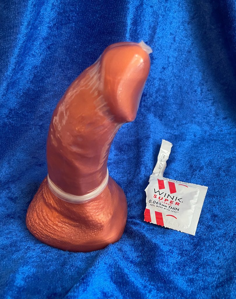 Ultra Thin Large condoms, Wink Super sheerlon latex condom on SquarePegToys Steve Actual size