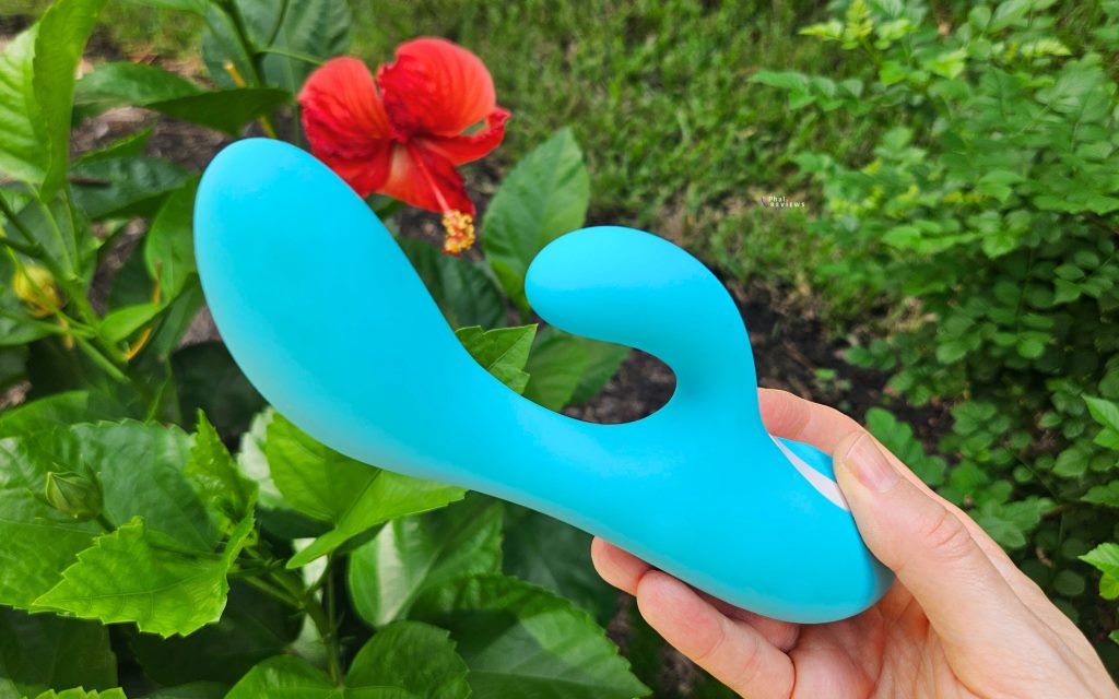 BMS Wonderlust St Tropez adjustable intensity rabbit vibrator in hand, by hibiscus