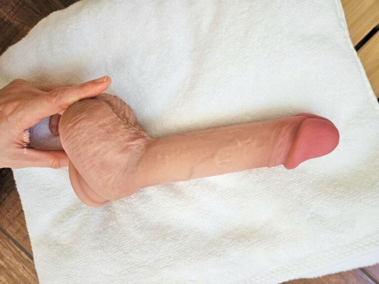 Solina Balla with finger behind to show sizing of silicone balls