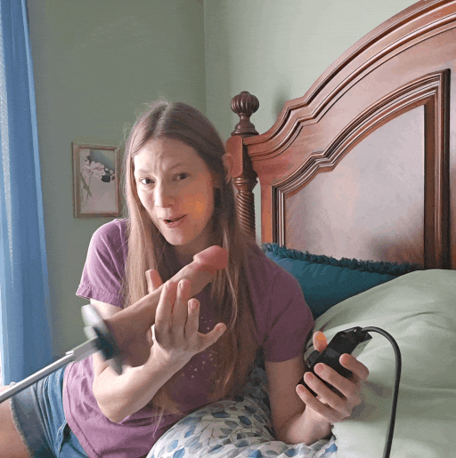 GIF of reviewer's face reacting while the Solina thrusts (slowed)