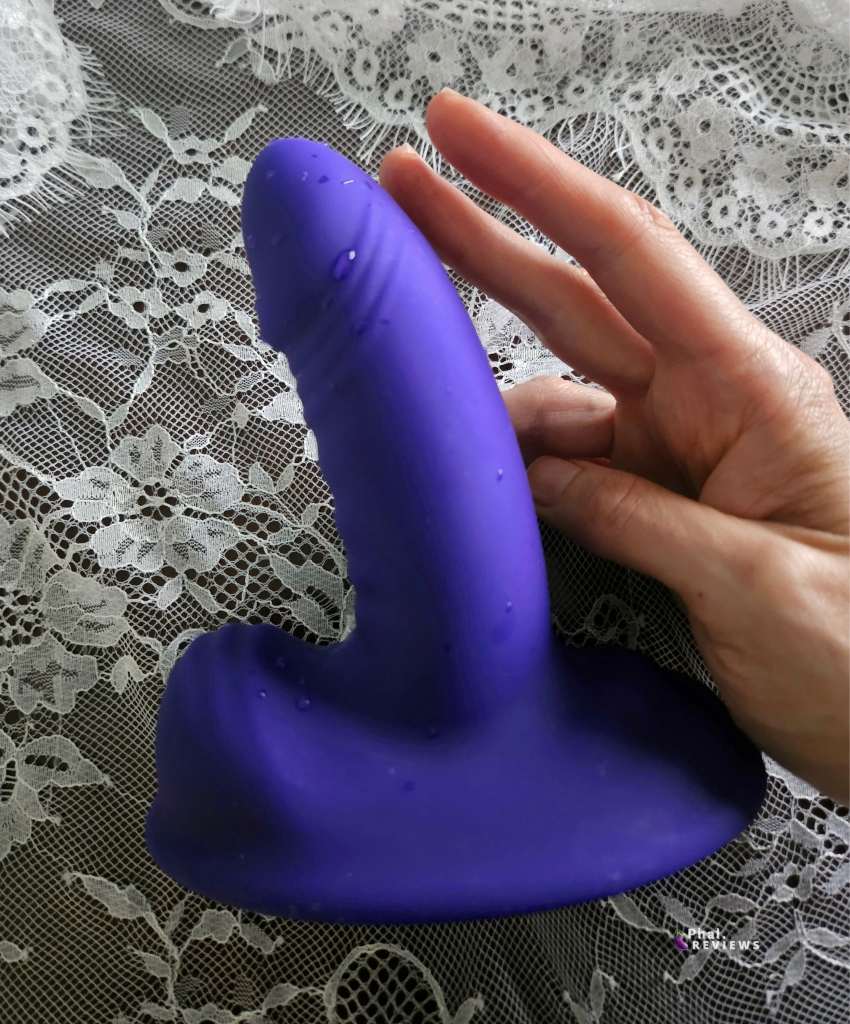 Thrill Ride vibrator length shown next to fingers for size comparison