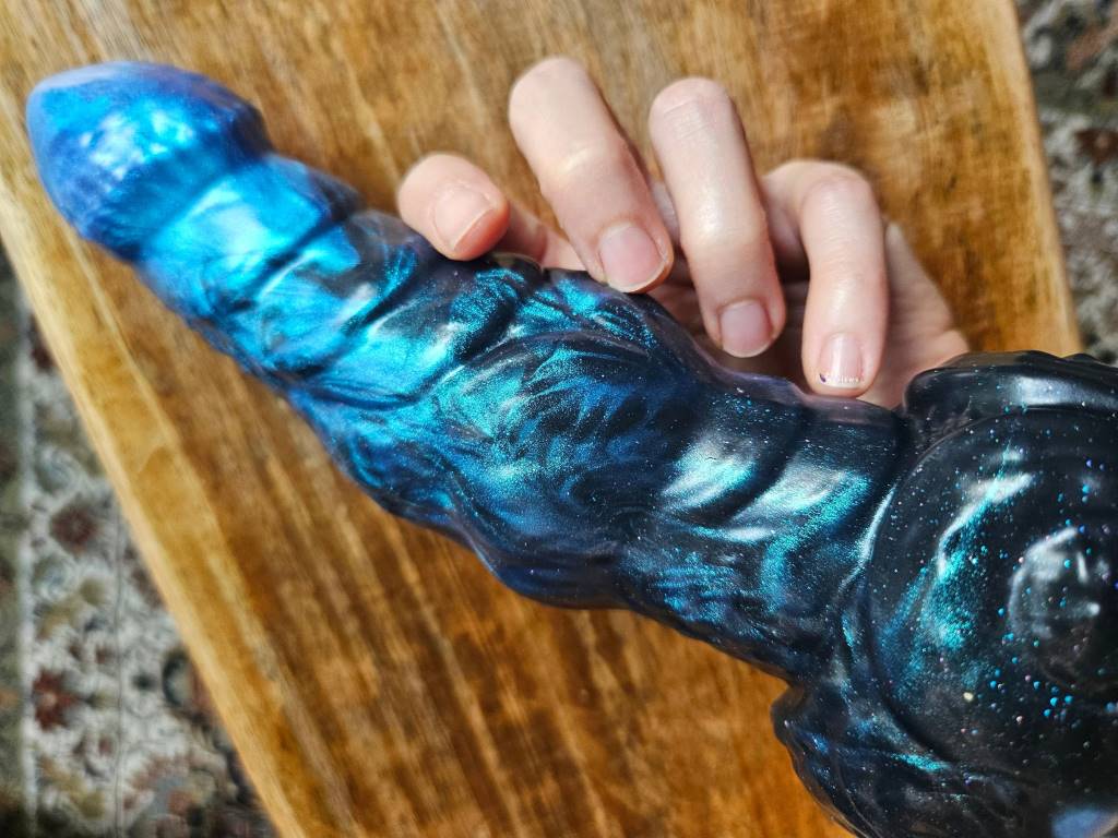 Uberrime Ardor knotted fantasy sex toy medium size in hand