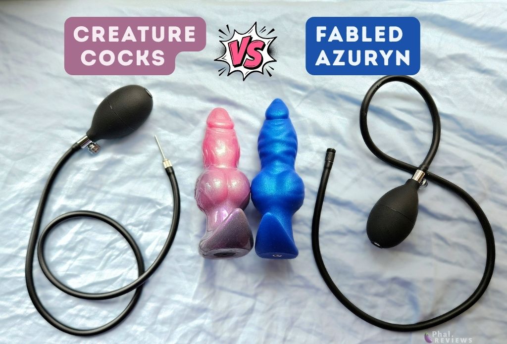 side by side view of Creature Cocks  pink to light purple Astro plug vs. Fabled toys Azuryn royal blue inflatable fantasy plugs showing different attachment types for the black silicone tubing, and different textured designs, over blue sheet background